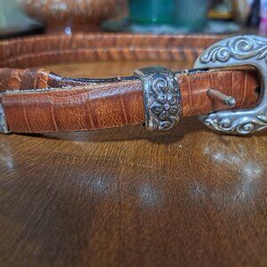 Vintage western style weaved brown leather belt.